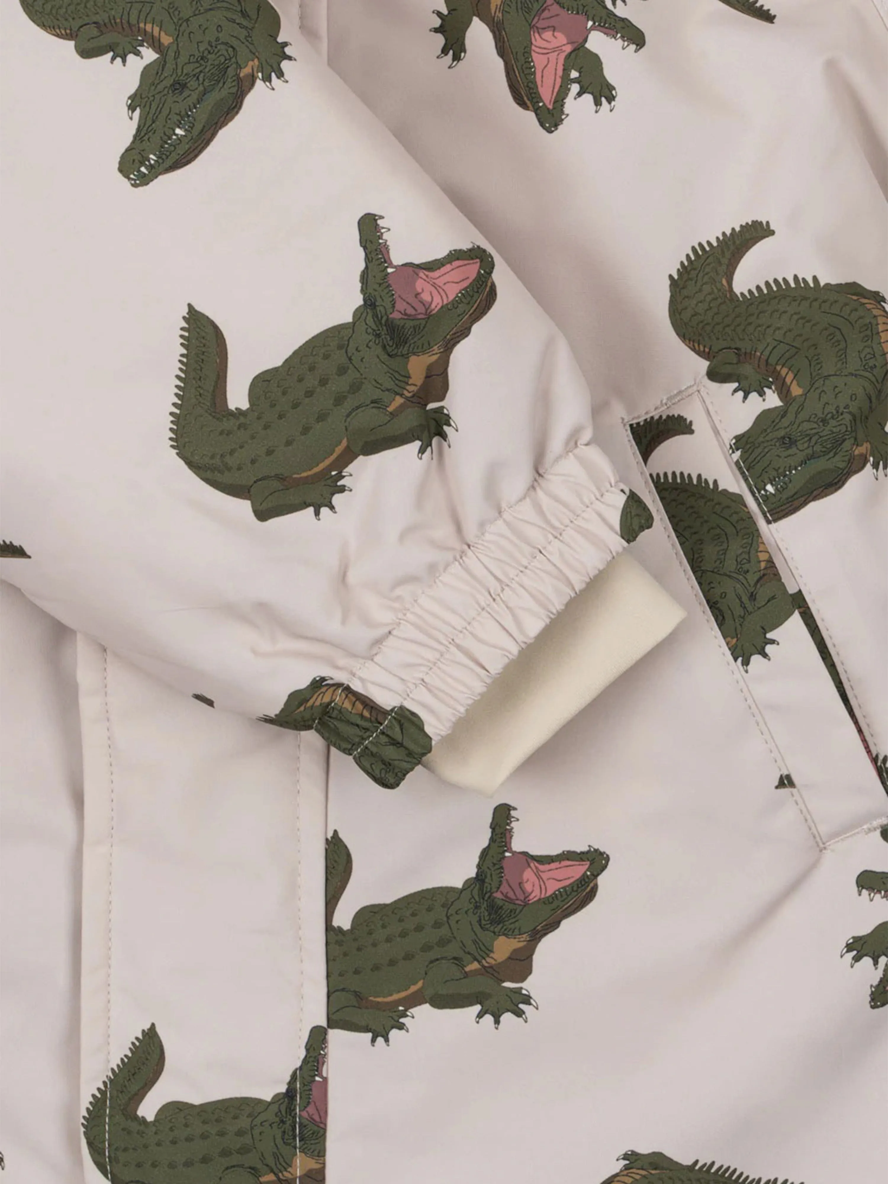 Konges Sløjd Kids Crocodile Nohr Snowsuit in Ivory